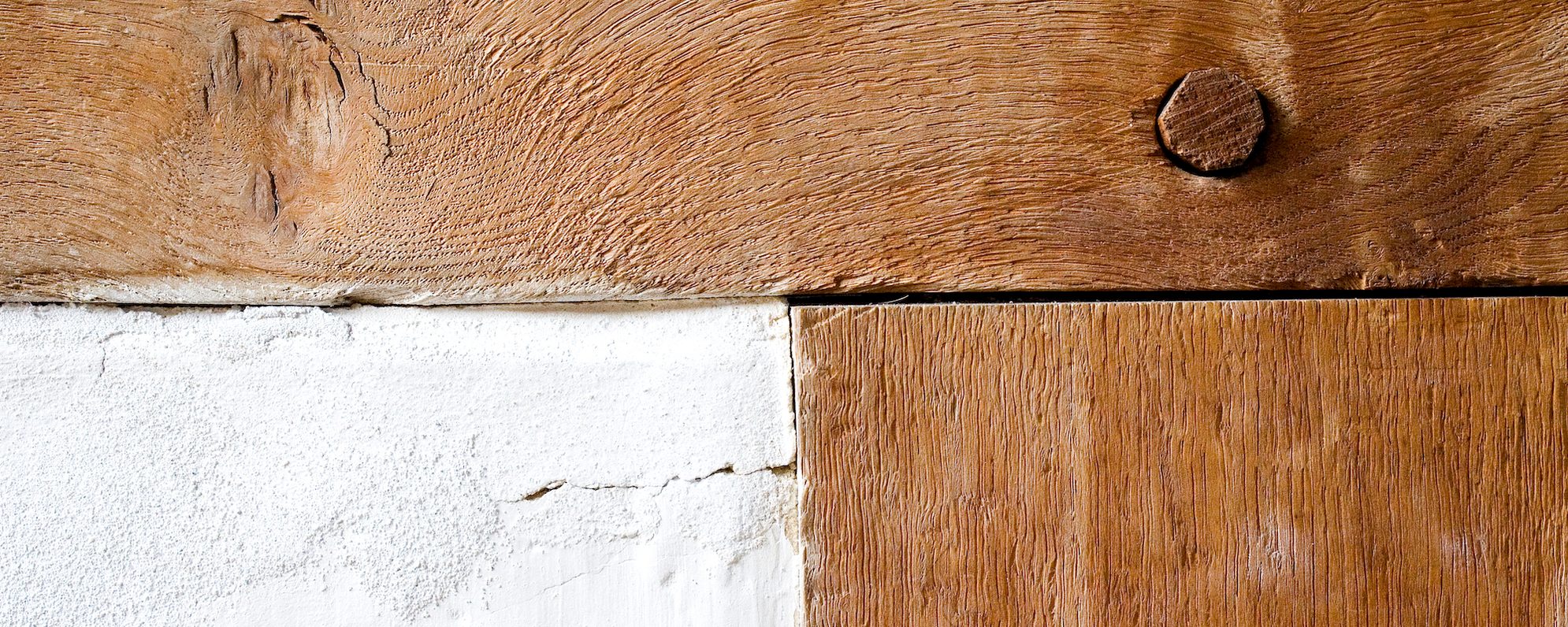 A close up of a wooden frame on a building