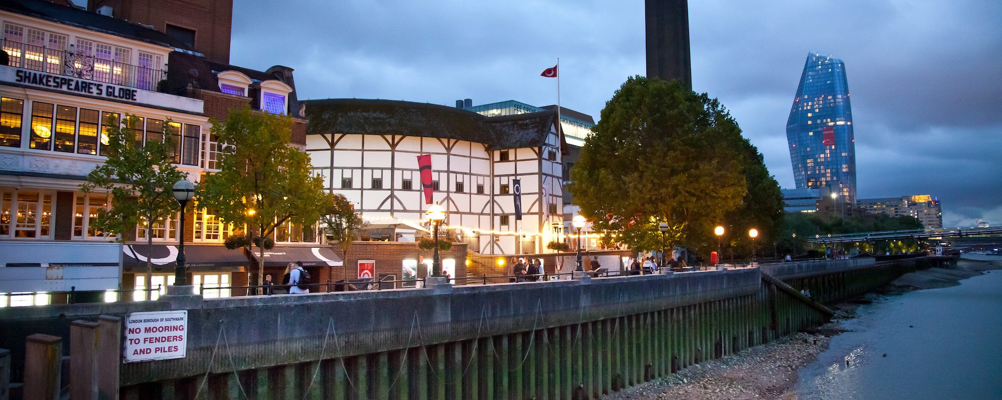 Shakespeare's Globe by the riverside at night time