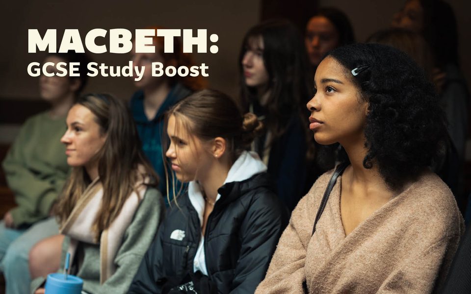 A group of young females sitting together watching a stage. Overlaid text reads Macbeth: GCSE study boost