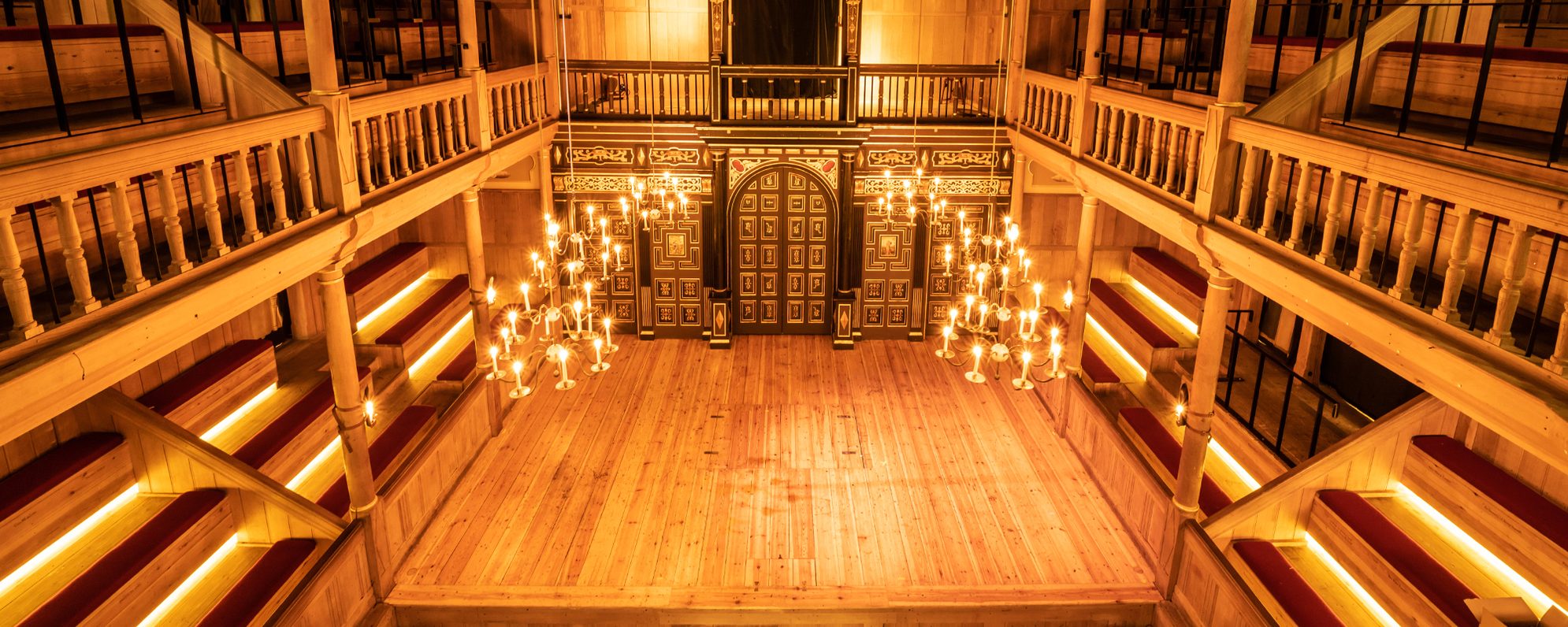 Empty stage with lit candels