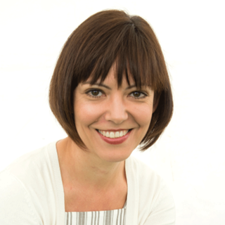 Headshot of abigail rokison-woodall looking straight to camera.