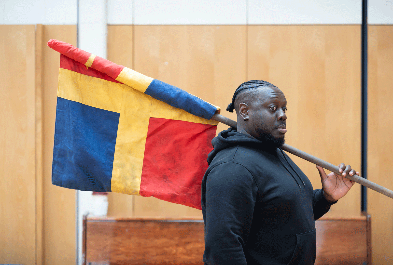 Ekow Quartey as Benedick. Photography by Marc Brenner.